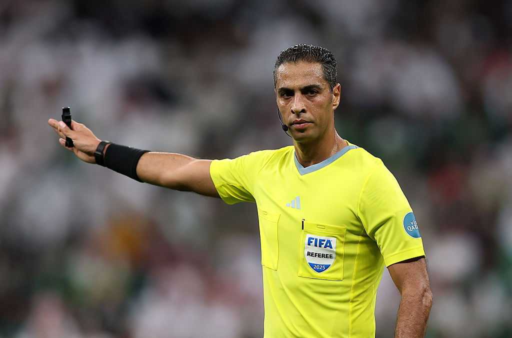 LUSAIL CITY, QATAR - DECEMBER 11: Referee Amin Mohamed Omar gestures during the FIFA Arab Cup 2025 Quarter Final match between Palestine and Saudi Arabia at Lusail Stadium on December 11, 2025 in Lusail City, Qatar. (Photo by Mohamed Farag - FIFA/FIFA via Getty Images)