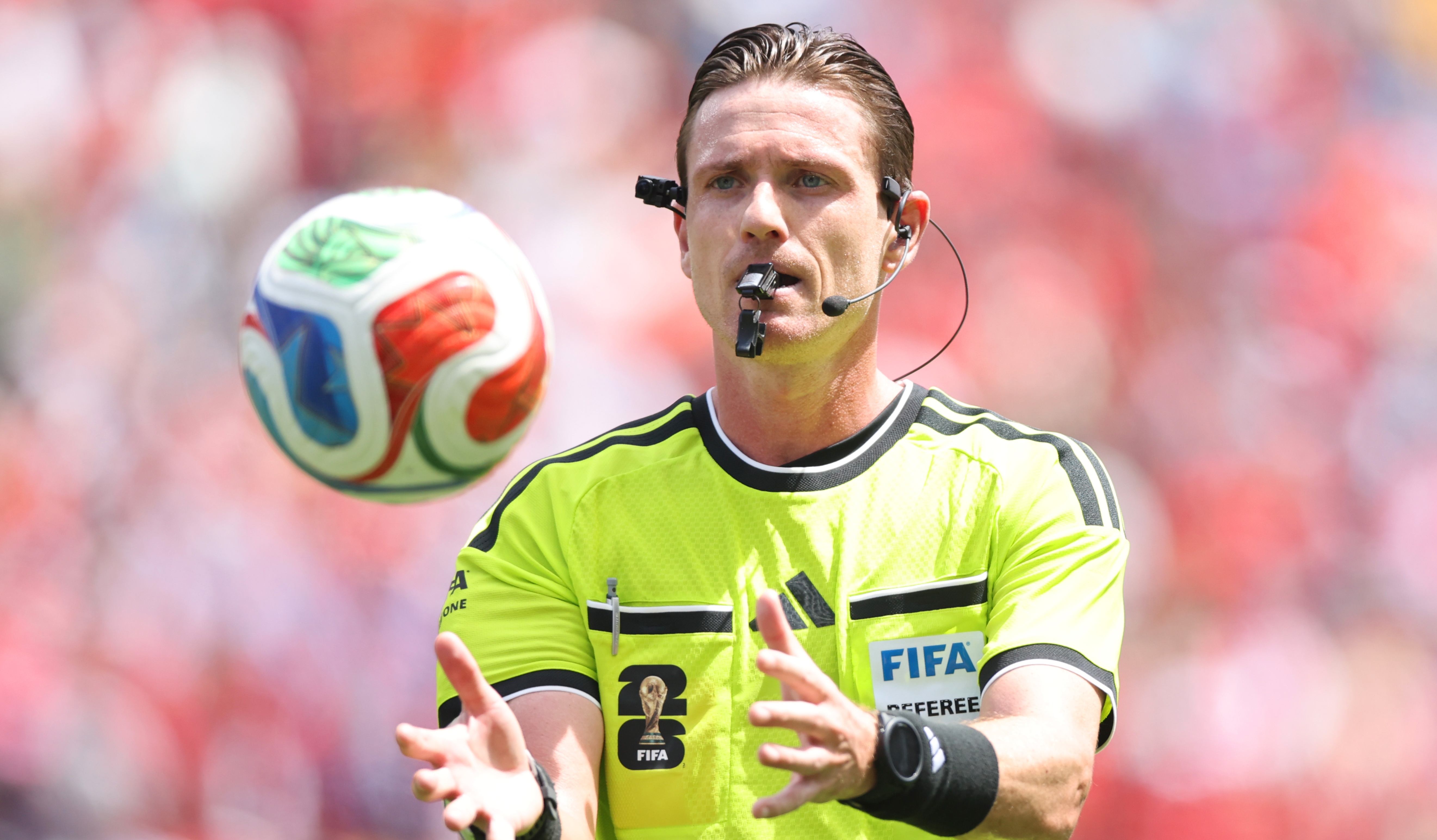 Referee Ramon Abatti catches the ball during the FIFA World Cup 2026 Group G match between Belgium and Egypt at Seattle Stadium on June 15, 2026 in Seattle, Washington