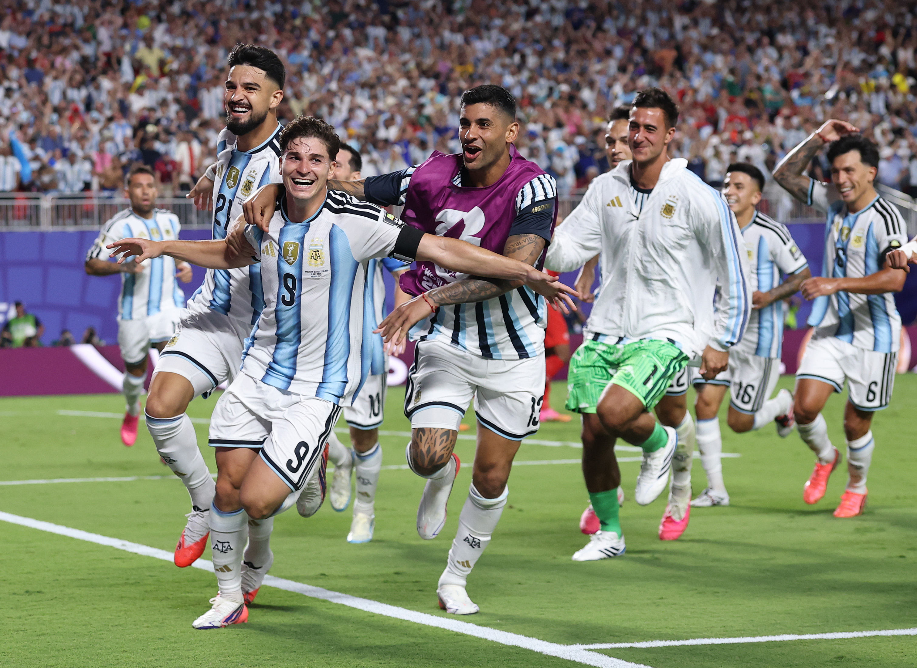 KANSAS CITY, MISSOURI - JULY 11: Julian Alvarez #9 of Argentina celebrates with teammates after scoring his team's second goal during the FIFA World Cup 2026 Quarter Final match between Argentina and Switzerland at Kansas City Stadium on July 11, 2026 in Kansas City, Missouri. (Photo by Carl Recine/Getty Images)
