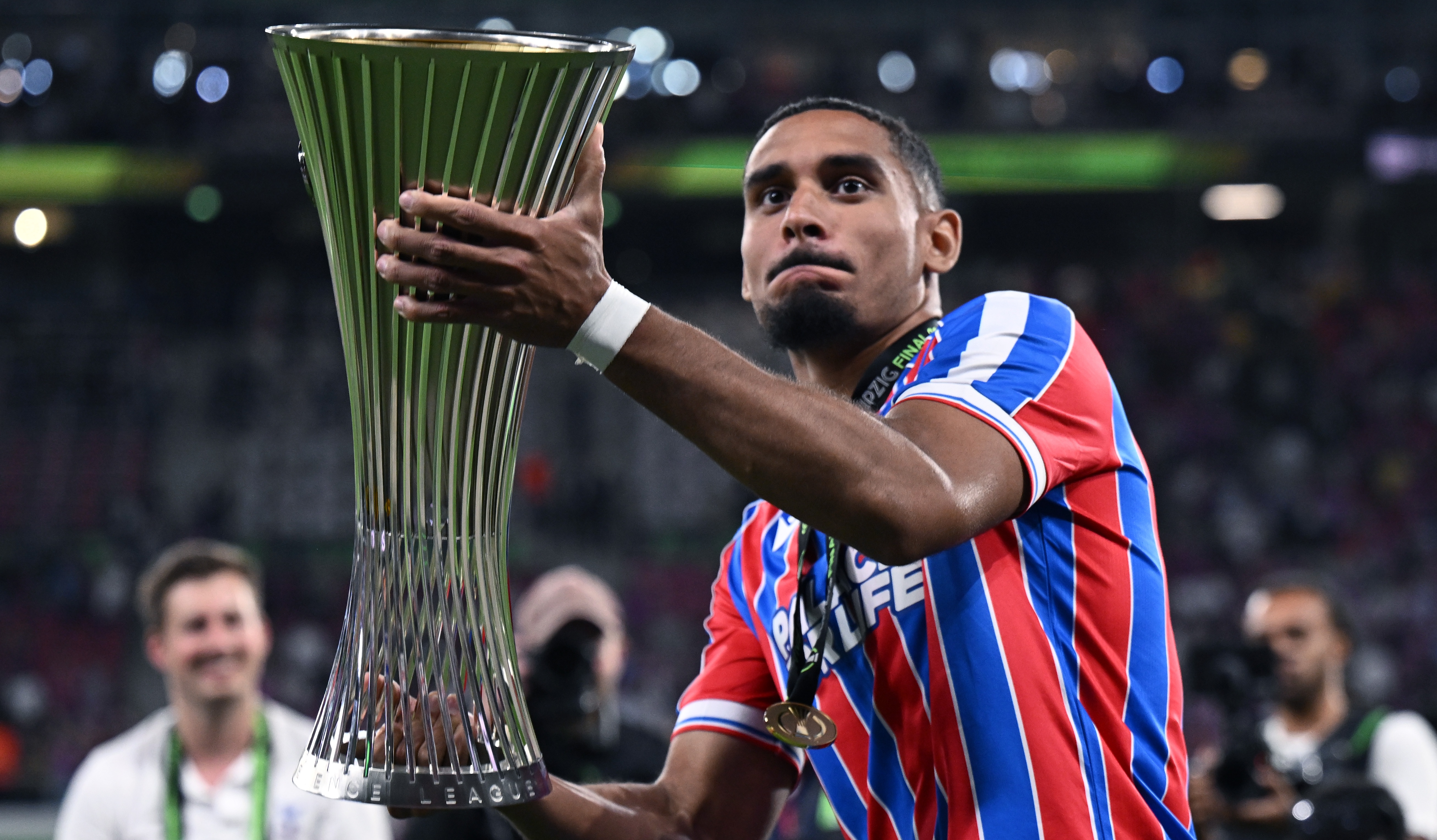 Maxence Lacroix celebrates at the end of the UEFA Conference League Final 2026 between Crystal Palace FC and Rayo Vallecano de Madrid at Football Arena Leipzig on May 27, 2026 in Leipzig, Germany