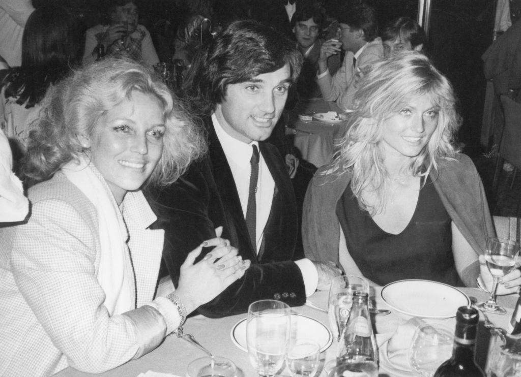 Footballer George Best with his wife, the former Miss World Mary Stavin (right), at the Silver Clef Pop Awards held at the Hotel Intercontinental, London, 6th June 1982. (Photo by Dave Hogan/Hulton Archive/Getty Images)