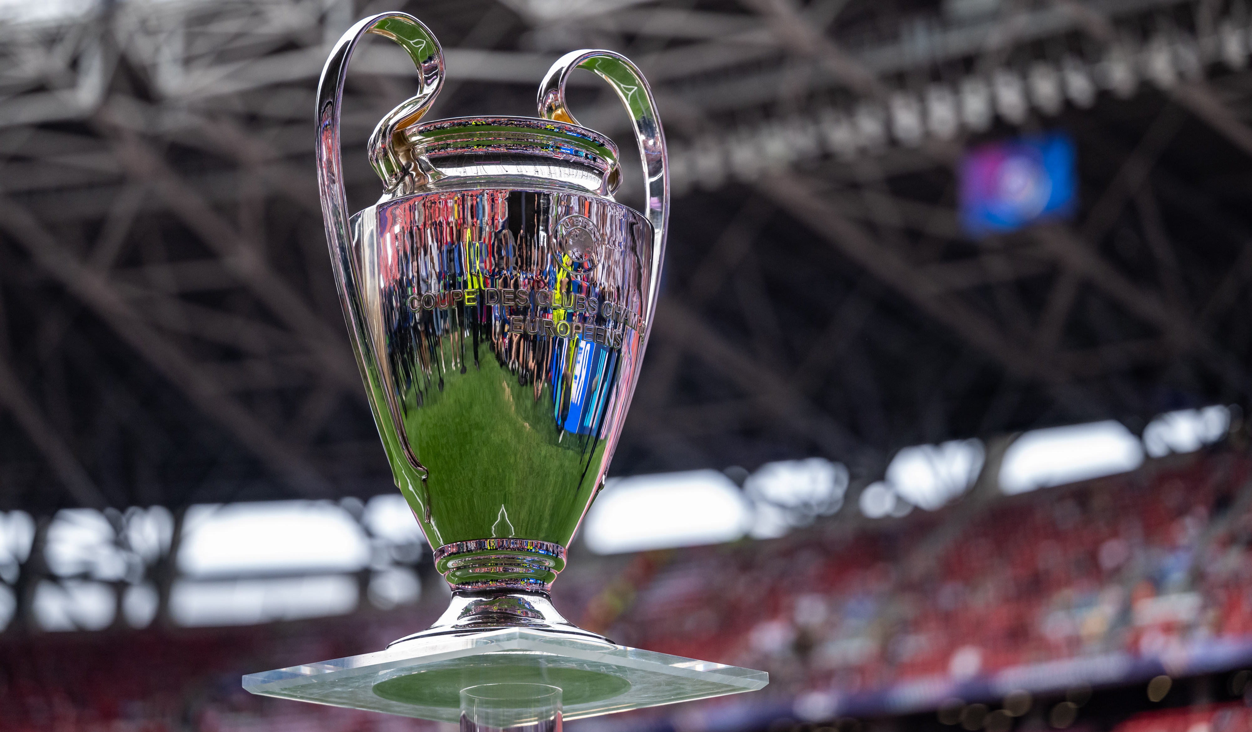 The Champions League Trophy being displayed on a plinth prior to the UEFA Champions League Final 2026 match between Paris Saint-Germain and Arsenal FC.