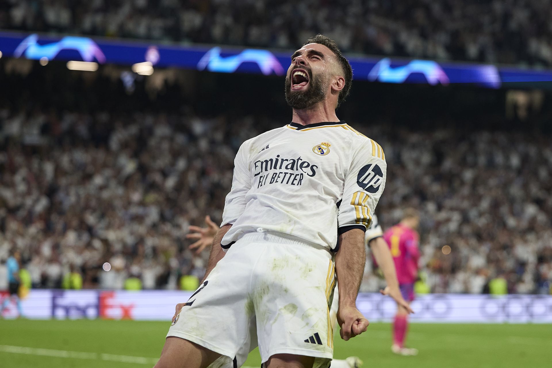 Dani Carvajal celebrates a late Real Madrid goal, scored by Joselu, in Los Blancos' Champions League semi-final second leg against Bayern Munich in May 2024.